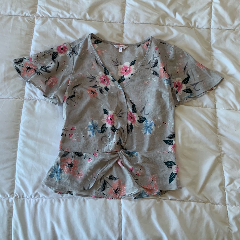 grey floral blouse
